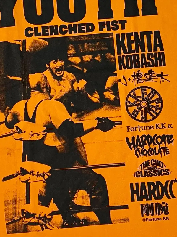 小橋建太 マシンガンチョップ（青春の握りこぶしオレンジ）　Tシャツ